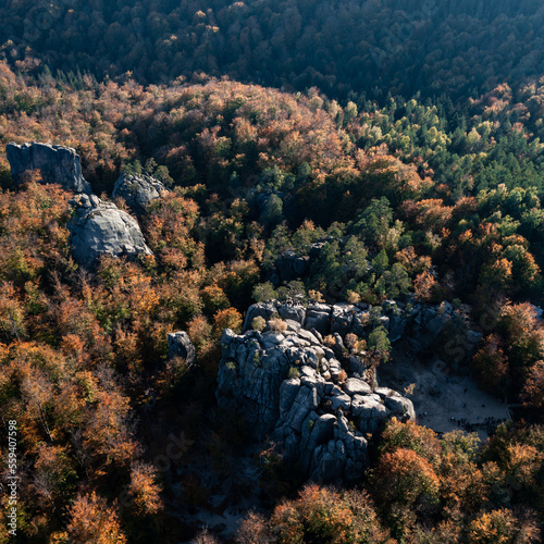 Dovbush rocks and a view of them from a height, a photo of Dovbush rocks from a drone in autumn. © Niko_Dali