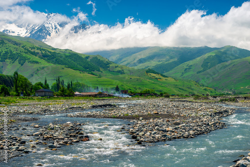 Stormy mountain river flowing among the stones. North Caucasus. Russia