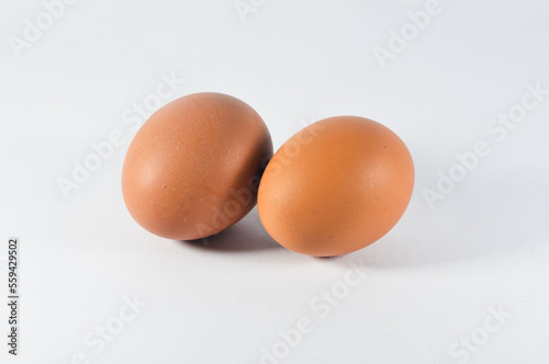 raw chicken eggs on a white background