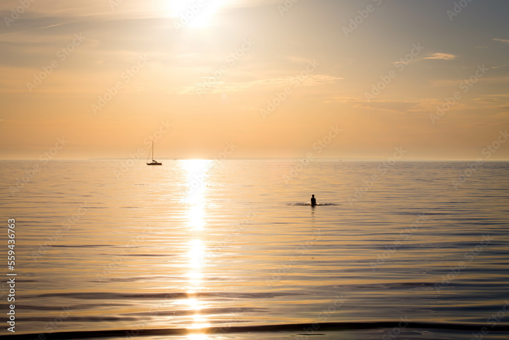 ocean boy in sunset light