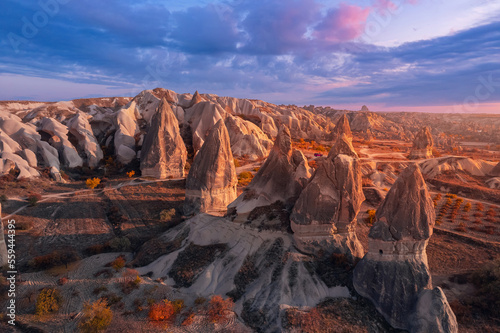 Aerial top view Sunset landscape Cappadocia stone and old cave house in Goreme national park Turkey sunlight banner
