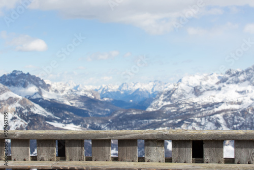 Wood table in winter mountains