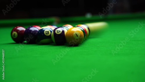 The initial blow to the pyramid of balls in Billiard