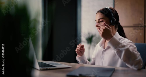 Female psychologist, actively gesticulating, gives client advice on improving mental state and combating bad mood. Young caucasian woman conducts personal psychological online consultation from home.