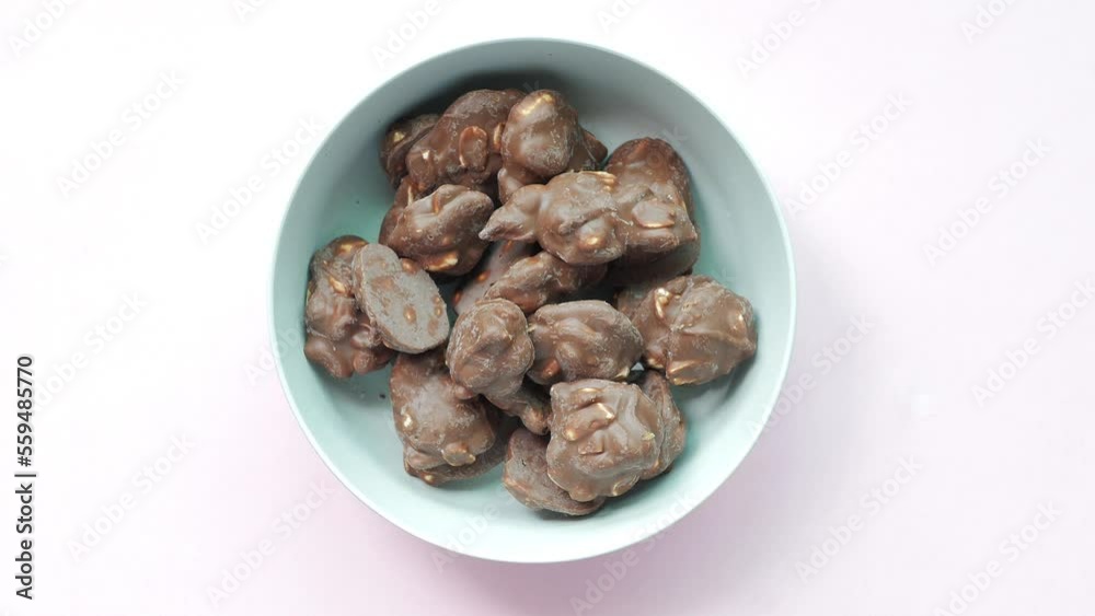 close up of peanut chocolate candy on table close up of peanut chocolate candy on table