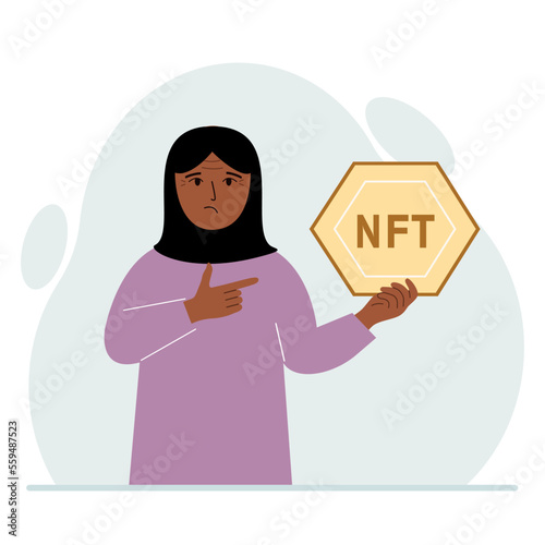 NFT concept. The muslim woman is holding nft in his hand. Works of art using non-fungible tokens for auctions, sale and purchase of works of art.