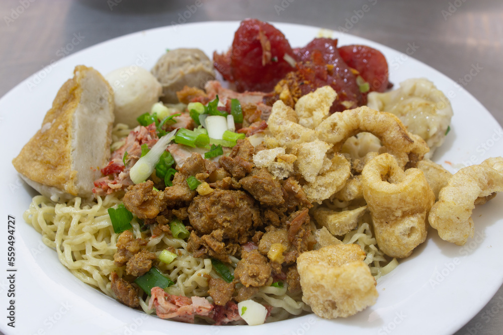 bakmi or meat noodles with a total of 9 toppings of various processed meat bakmi or meat noodles with a total of 9 toppings of various processed meat