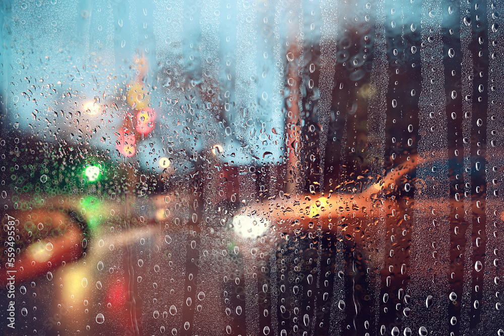 Fototapeta premium water drops window rain car traffic night, November weather