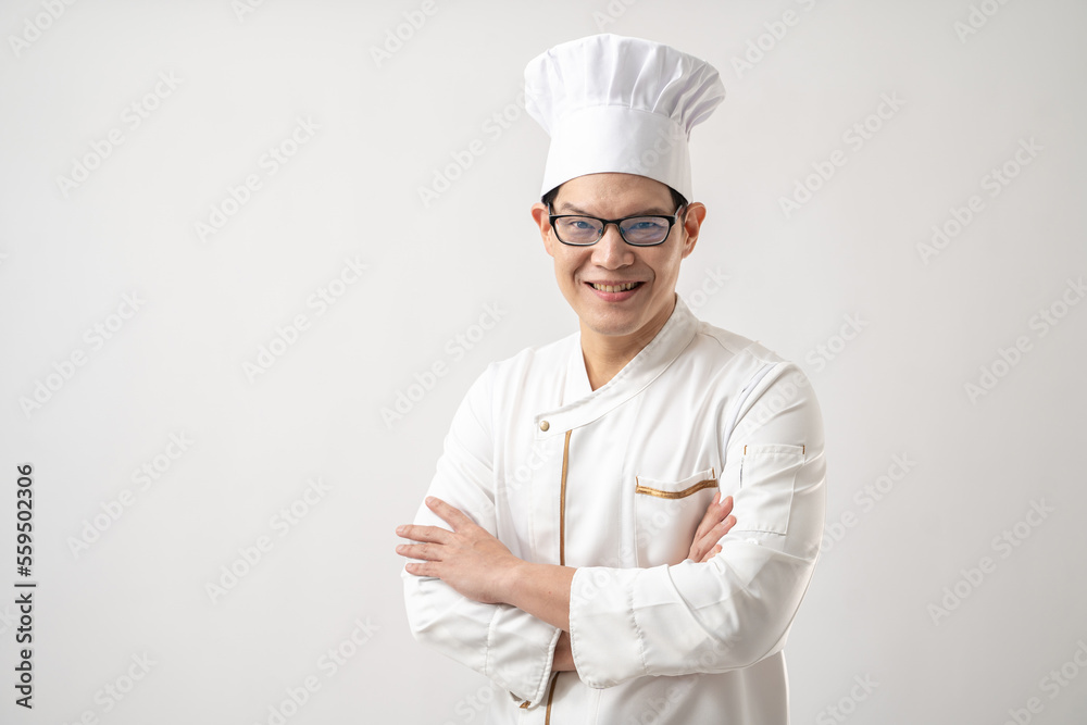 Portrait of confident Asian chef in uniform isolated on white background Portrait of confident Asian chef in uniform isolated on white background