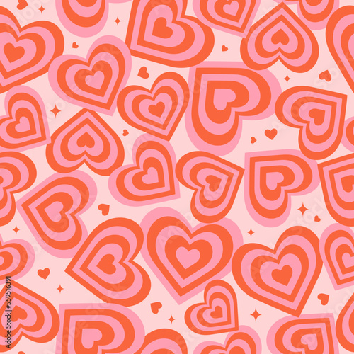 Groovy hearts seamless pattern. Trendy romantic vector background in 1970s-1980s. Hippie retro style for print on textile, wrapping paper, web design and social Media. Red and pink colors.