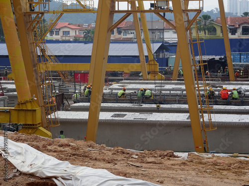 MELAKA, MALAYSIA -JULY 1, 2022: Fabrication yard for prestress concrete precast beam. These beams are built here before being transported to the construction site. 