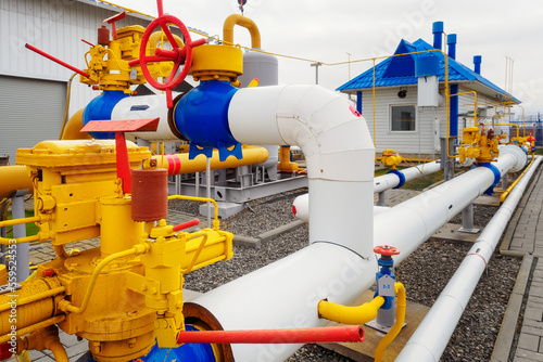 Gas distribution station. Pipes, valves and equipment of compressor station. Type of industrial facility. Industrial background. Natural gas supplier..