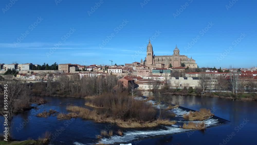View of the Salamanca cathedral reflected in the Tormes river View of the Salamanca cathedral reflected in the Tormes river