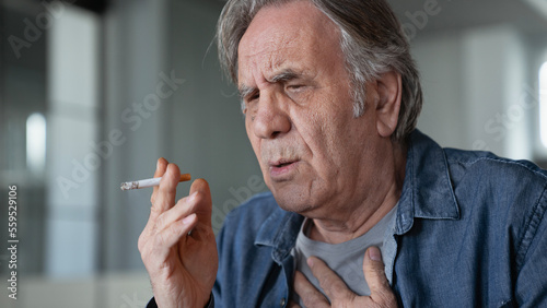 Old man smoking a cigarette