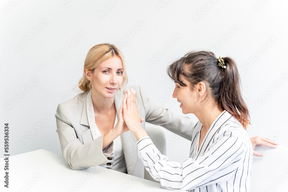 Businesswoman working at the company talking to colleagues, teamwork. Businesswoman working at the company talking to colleagues, teamwork.