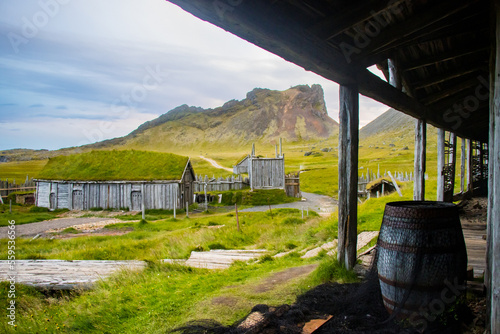 Fototapeta Naklejka Na Ścianę i Meble -  Old Viking Village ruins of Kattegatt  with black sand beach, viking boat, Atlantic Ocean Iceland