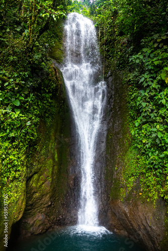 panorama of a hidden tropical waterfall in costa rica  waterfall in the rainforest  don jose waterfalls
