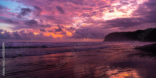 panorama of paradise Costa Rica beach at sunset  colorful sunset on tropical san miguel beach over the pacific © Jakub