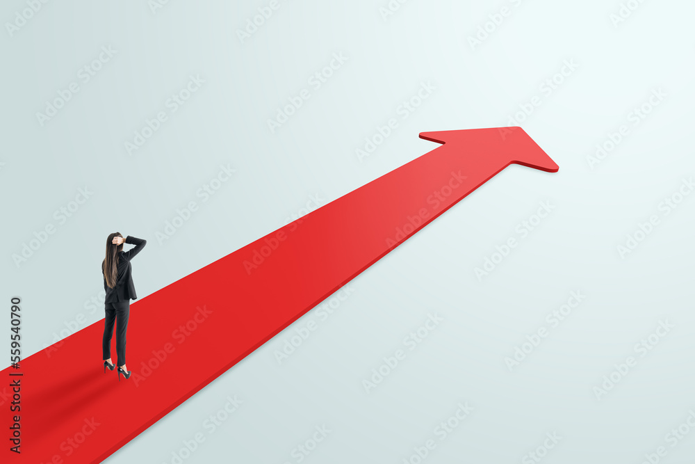 Goal, aim at target and decision concept with pensive businesswoman perspective view staying on red arrow on abstract light grey background Goal, aim at target and decision concept with pensive businesswoman perspective view staying on red arrow on abstract light grey background