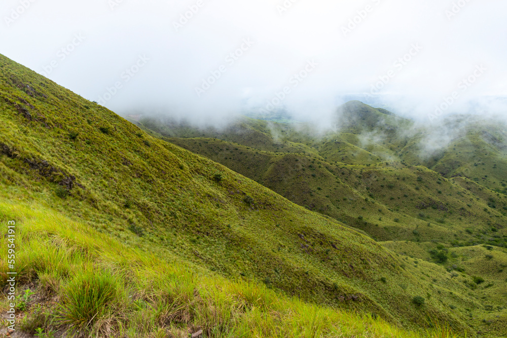 panorama of Costa Rica's cerro pelado mountains during cloudy, foggy weather; dark mountains in Costa Rica, Costa Rican rainforests panorama of Costa Rica's cerro pelado mountains during cloudy, foggy weather; dark mountains in Costa Rica, Costa Rican rainforests