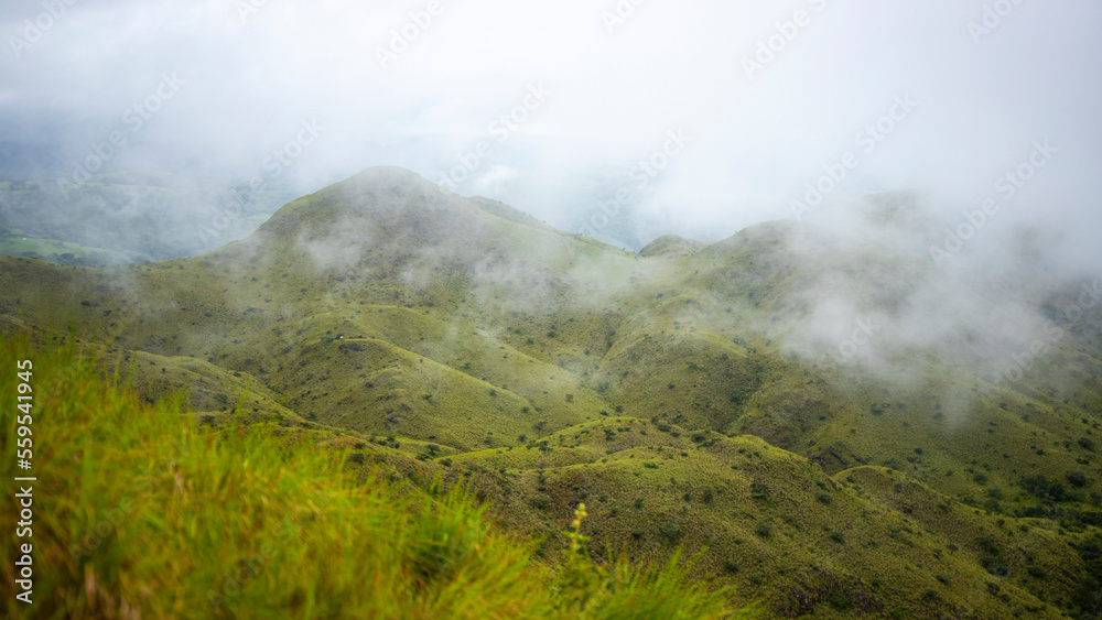 panorama of Costa Rica's cerro pelado mountains during cloudy, foggy weather; dark mountains in Costa Rica, Costa Rican rainforests panorama of Costa Rica's cerro pelado mountains during cloudy, foggy weather; dark mountains in Costa Rica, Costa Rican rainforests