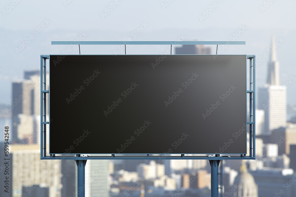 Blank black billboard on city buildings background, front view. Mockup, advertising concept Blank black billboard on city buildings background, front view. Mockup, advertising concept