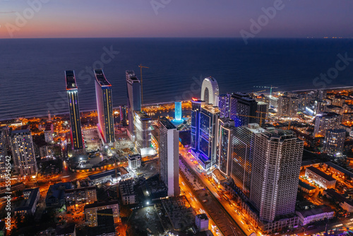 Wallpaper Mural Drone aerial view of skyscrapers in night Batumi City, Georgia Torontodigital.ca