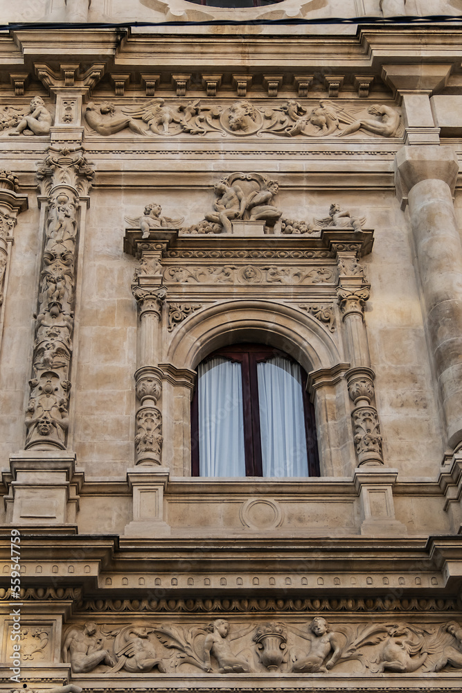 Architectural fragments of plateresque-style facade of the Seville town hall (old Casa consistorial de Sevilla, from 1540) on the Plaza de San Francisco. Seville, Andalusia, Spain.