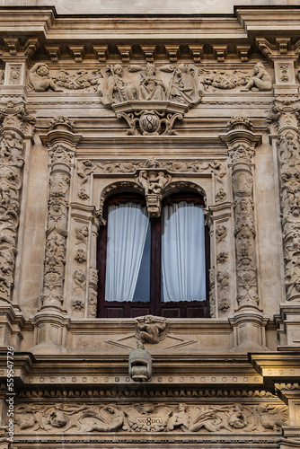 Architectural fragments of plateresque-style facade of the Seville town hall  old Casa consistorial de Sevilla  from 1540  on the Plaza de San Francisco. Seville  Andalusia  Spain.