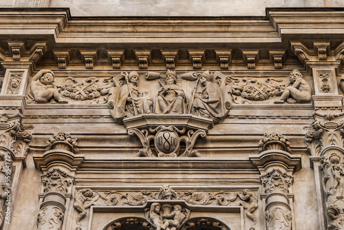 Architectural fragments of plateresque-style facade of the Seville town hall (old Casa consistorial de Sevilla, from 1540) on the Plaza de San Francisco. Seville, Andalusia, Spain. photo