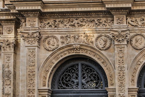 Architectural fragments of plateresque-style facade of the Seville town hall (old Casa consistorial de Sevilla, from 1540) on the Plaza de San Francisco. Seville, Andalusia, Spain. photo