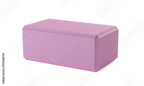 Single, pink foam yoga or pilates block laying on white background