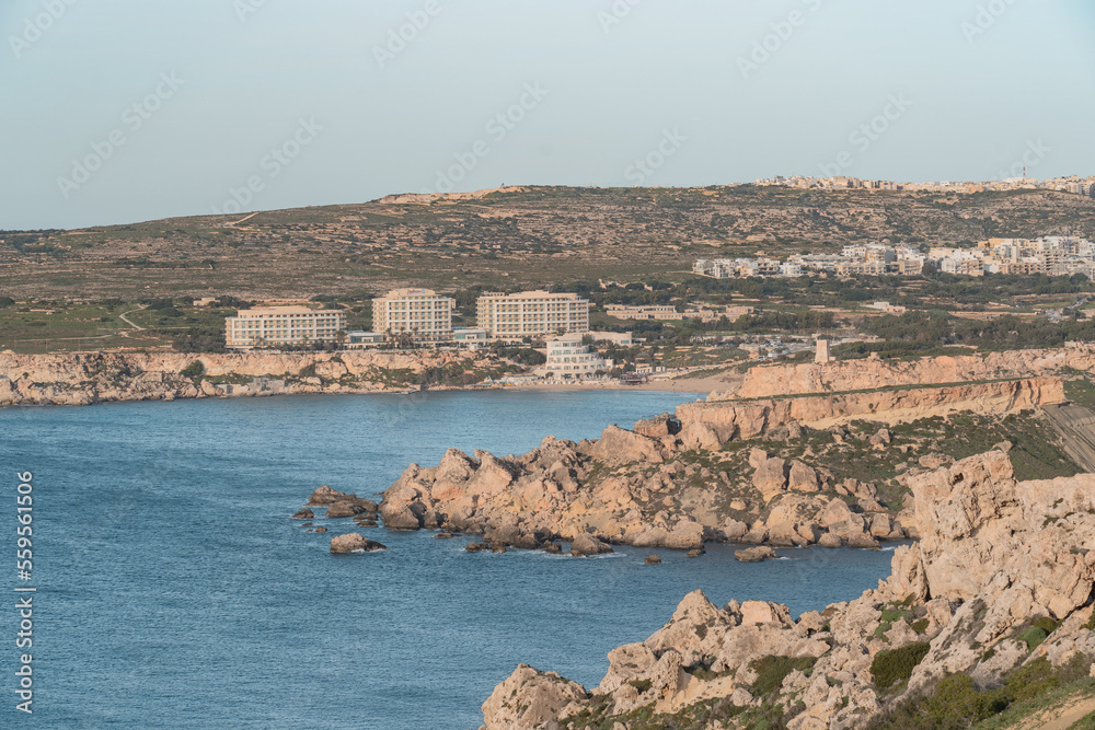 View over the rocks and Golden Bay in Malta. 
