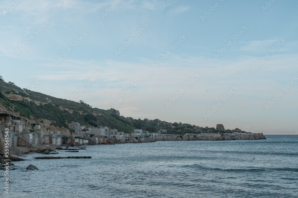 Boat houses at Gnejna Bay in Malta.