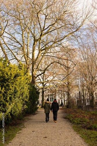 Couple walking in wertheimpark, amsterdam. Autumn season.