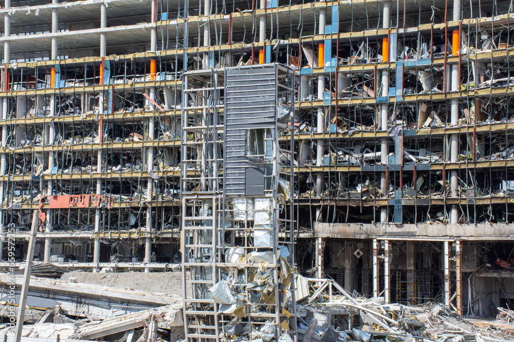 Consequences of the destroyed building of the shopping, office center by hitting a rocket missile. Photo for use in promotional activities