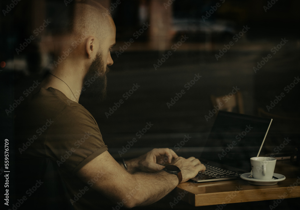 Person working in a coffee shop Person working in a coffee shop