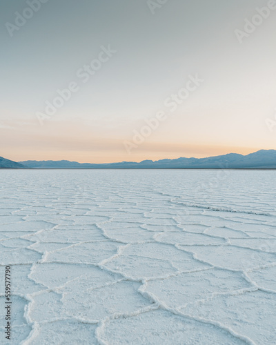 landscape photo of salt flats during sunrise