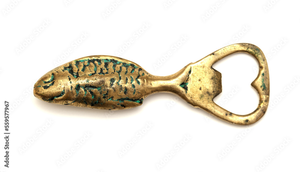 Obraz premium Vintage brass bottle opener, isolated on white background