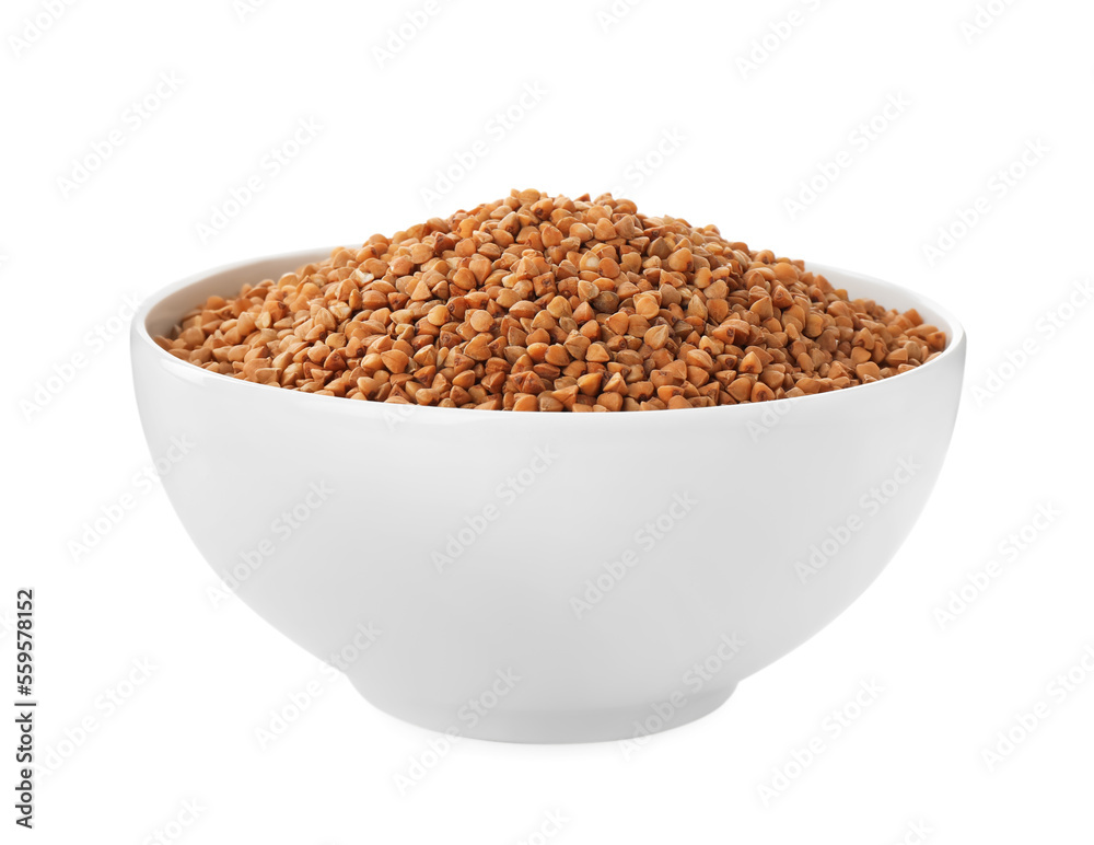 Uncooked buckwheat in bowl isolated on white Uncooked buckwheat in bowl isolated on white