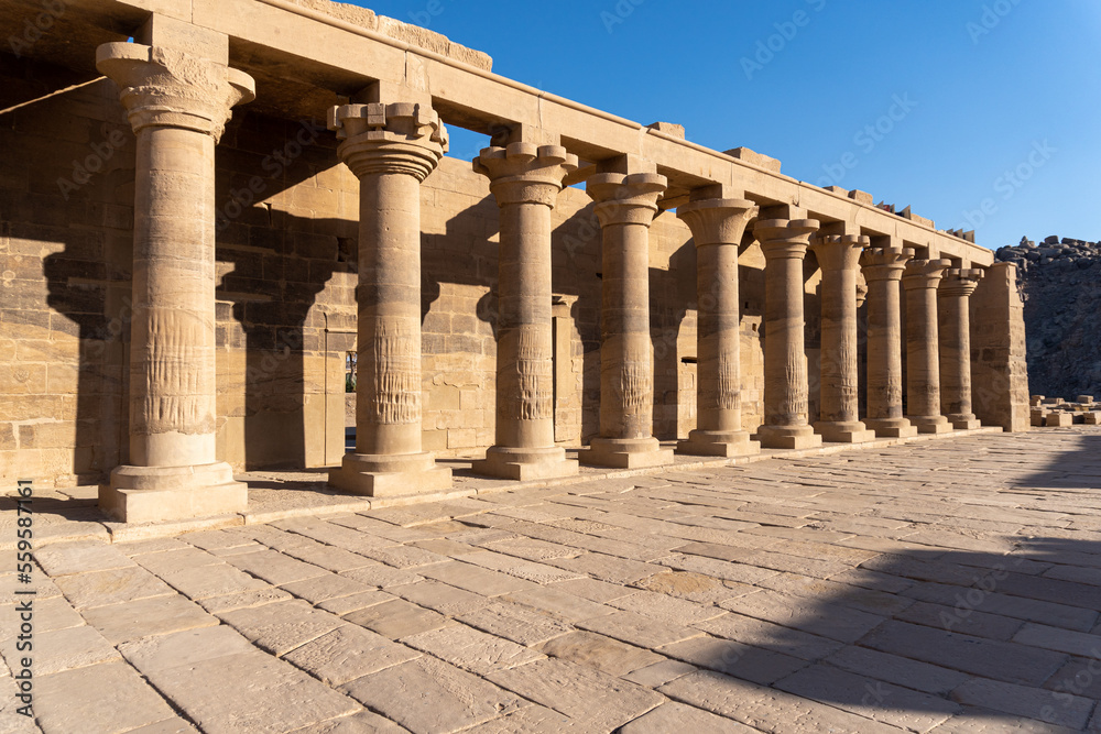 Columns of the Philae temple full of hieroglyphs.