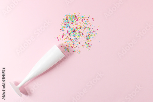 Glasses of champagne with candy on background. Celebration concept. Flat lay. Top view with copy space. © Ivana