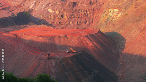 Iron ore quarry landscape with transport