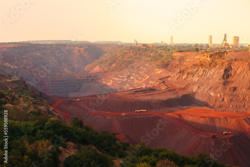 Iron ore quarry landscape with transport