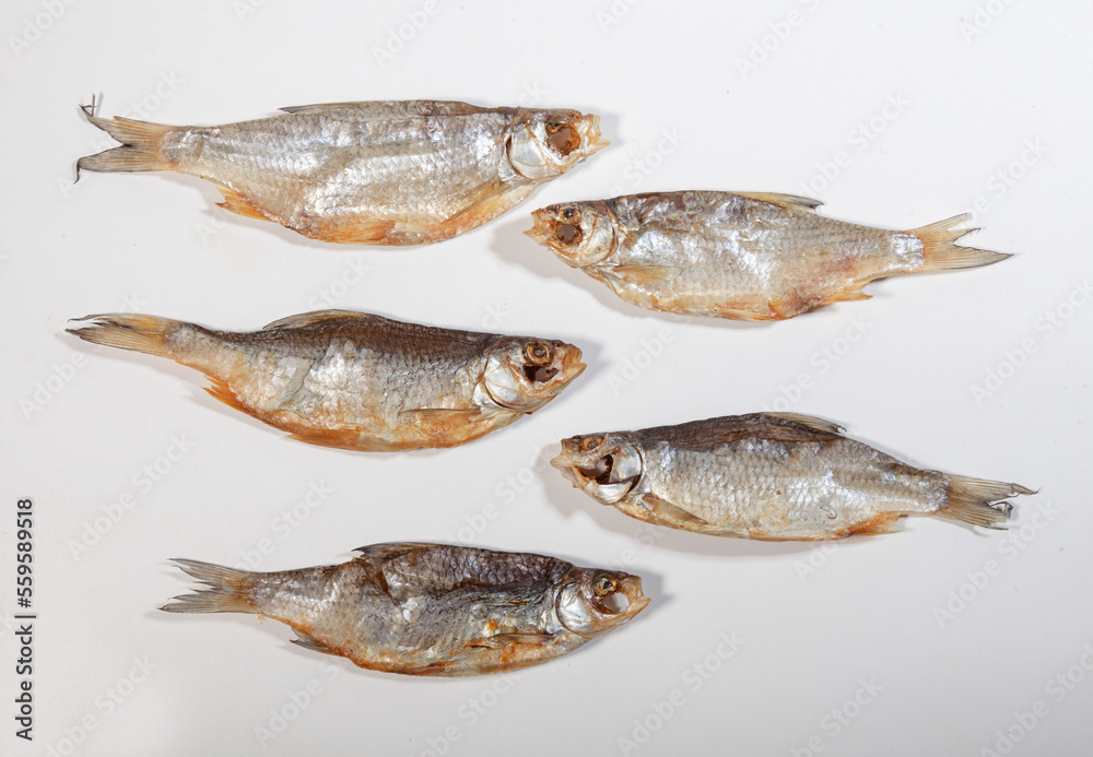 many dried fish vobla isolated on white background many dried fish vobla isolated on white background