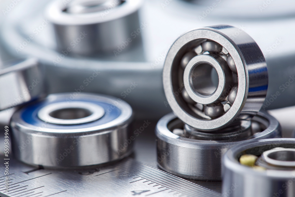 different bearings on a metal background. Part of mechanism. different bearings on a metal background. Part of mechanism.