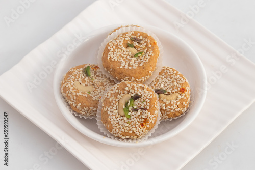 Winter Season Special Traditional Punjabi Mithai Til Tikki Or Tilkut Gud Mawa Bati Is Made Of Dry Roasted Sesame Seeds With Mava, Khoya, Jaggery, Gur, Desi Ghee Is Enjoyed On Makar Sankranti and Lohri