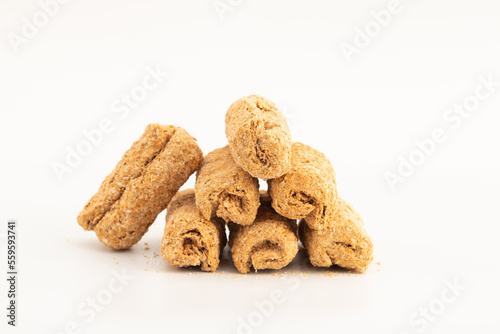 Khasta Gud Gajak Roll Mithai Or Gur Mawa Gazak Rolls Are Made Of Hammered Or Beaten Sesame Seeds, Condensed Milk, Khoya, Jaggery, Mava And Garnished With Pista And Badam For Makar Sankranti Or Lohri