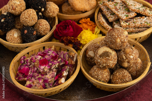 Gulab Gajak Mithai  Pista Gazak  Til Patti Or Papdi  Til Laddu Or Ladoo  Revdi And Rewri Made Of Tilgul  Mungfali  Sesame Seed  Jaggery Gud  Badam And Pista For Makar Sankranti Or Lohri Celebration