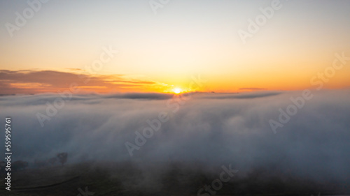 Fog and sunrise